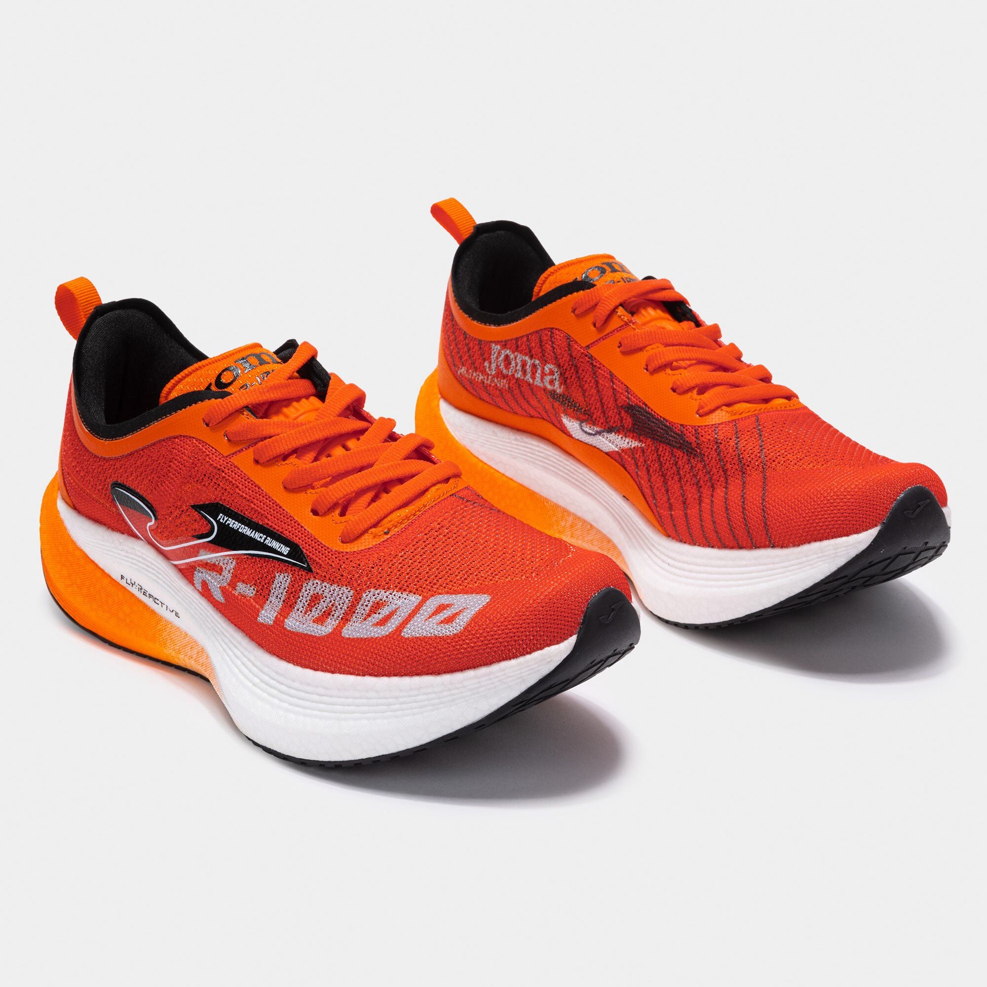 Running shoes R1000 unisex orange | JOMA®