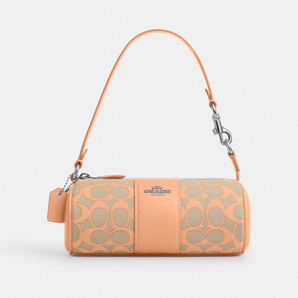 COACH® | Nolita Barrel Bag In Signature Jacquard